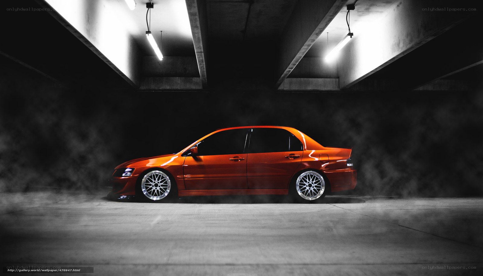 orange car in garage