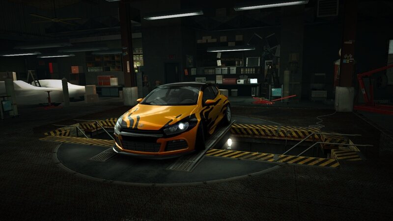 orange car in garage