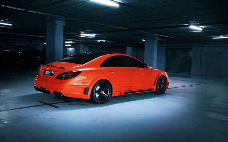 Orange Car in Garage — Dramatic, Night, Photograph