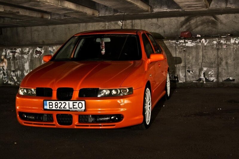 Orange Car in Garage — Dramatic, Night