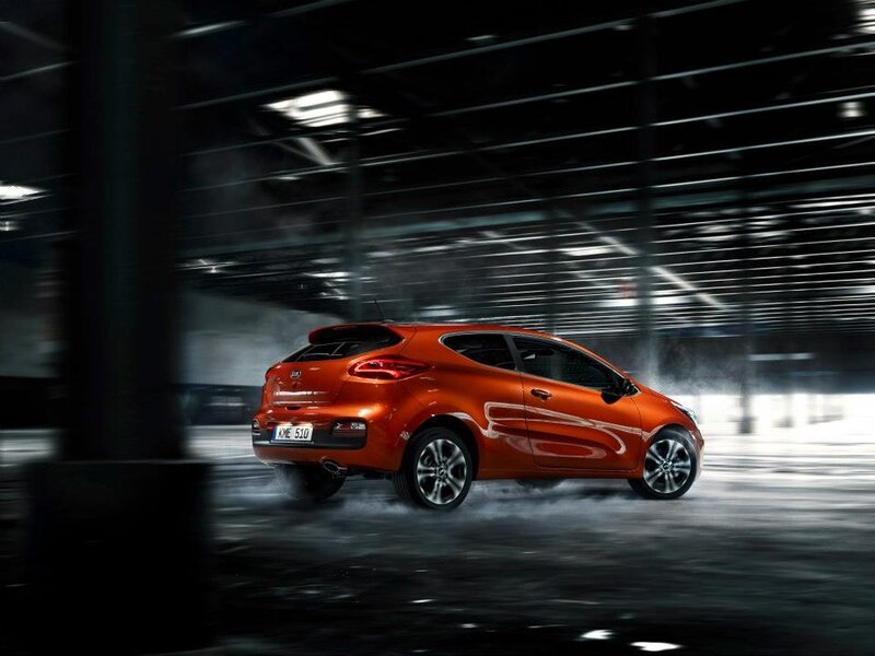 Orange car in motion