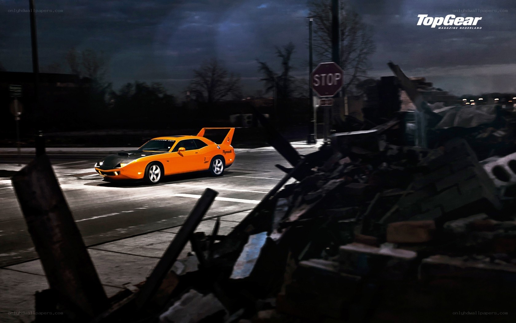 Orange car on a dark street