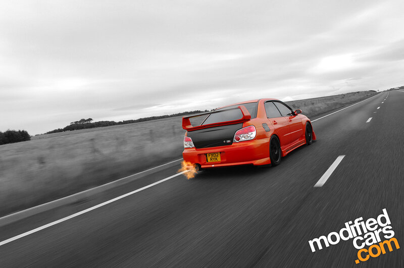 Orange car on a road