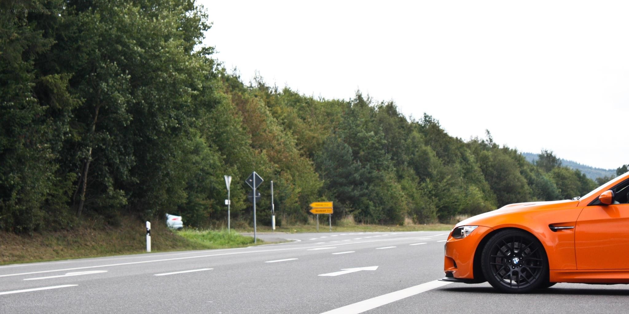 orange car on a road