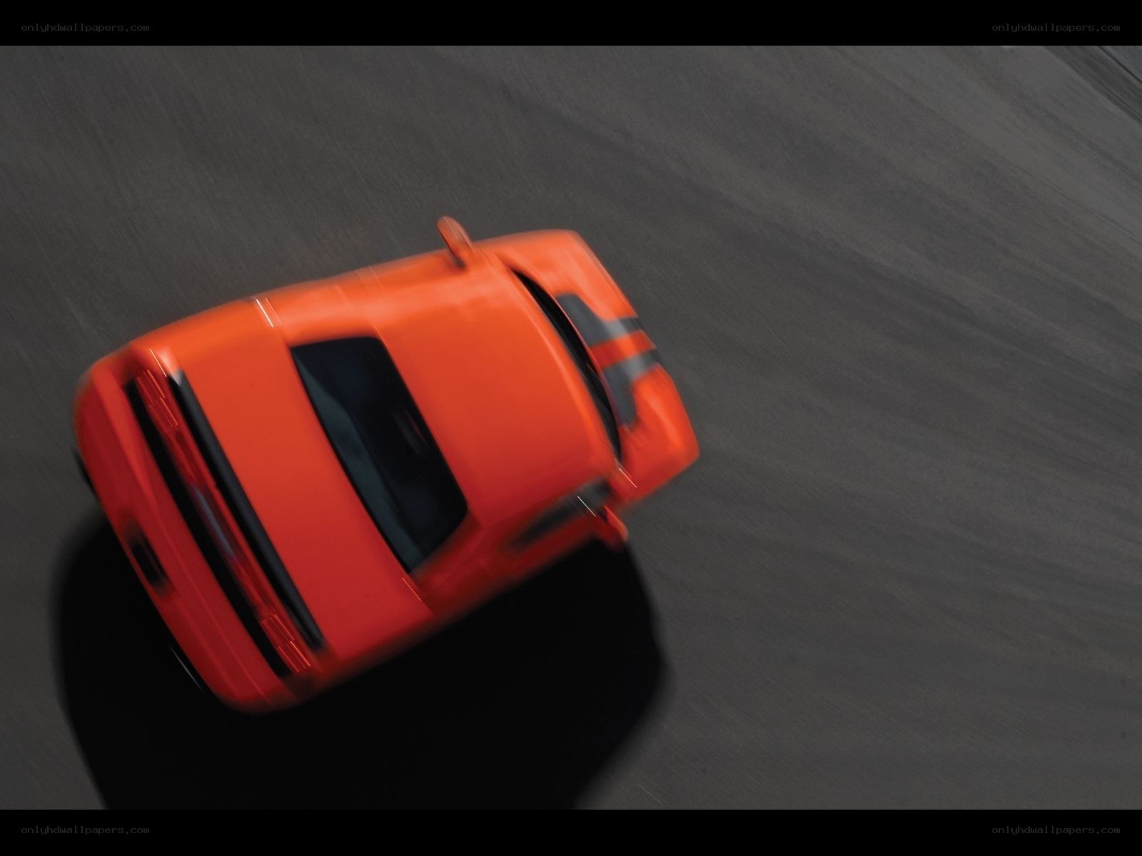 orange car on racetrack