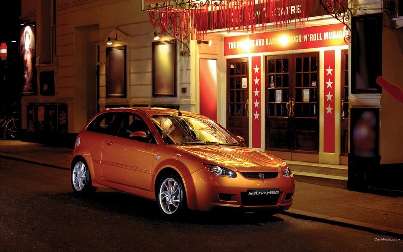 Orange Car on Street — Dramatic
