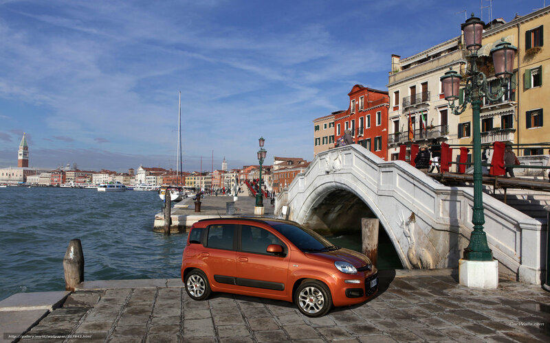 Orange car on Venice canal