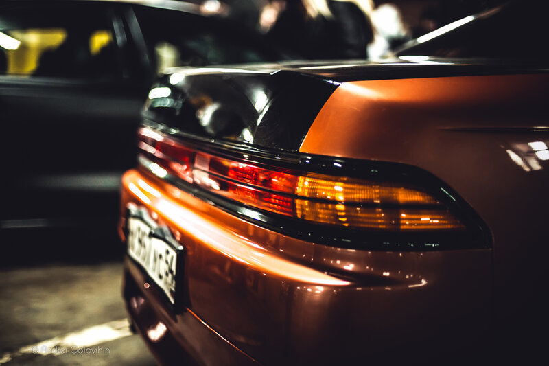 Orange Car Rear View — Dramatic