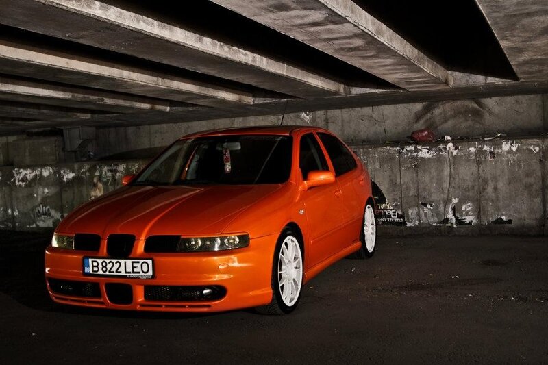 Orange Car under Bridge — Dramatic