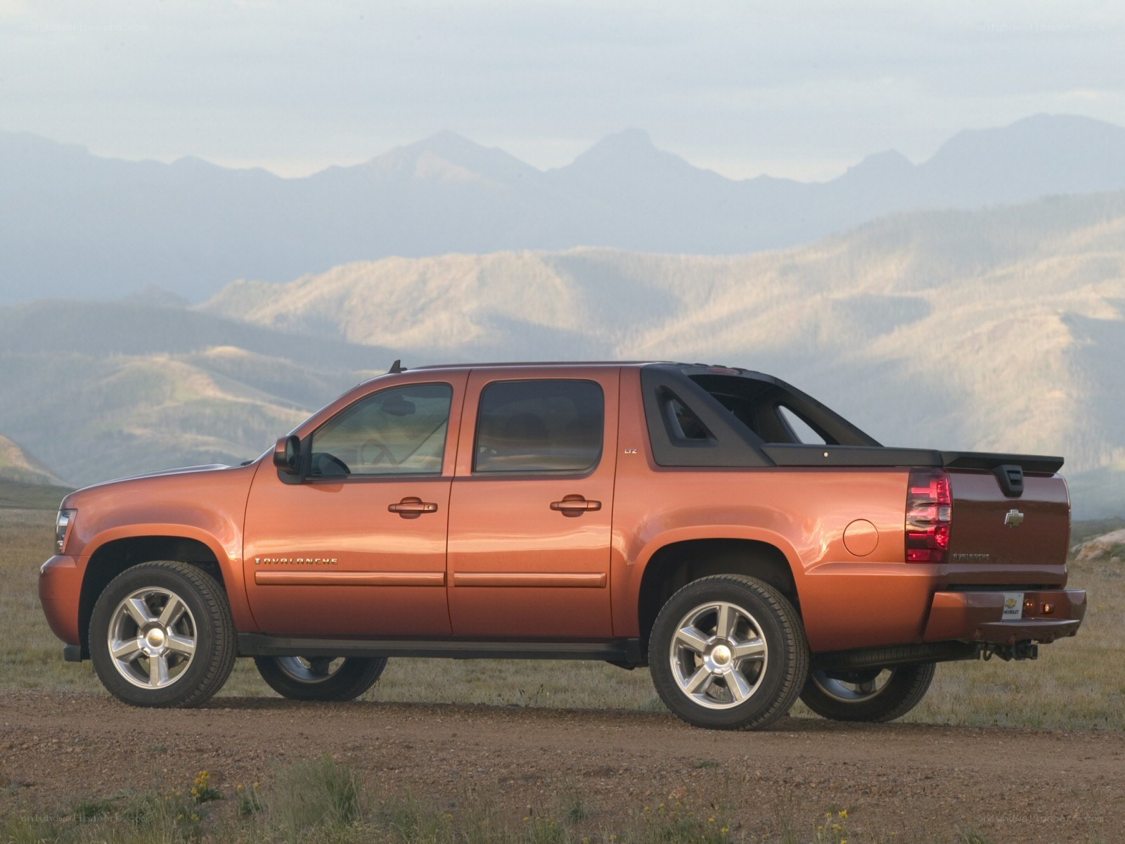orange chevrolet avalanche truck