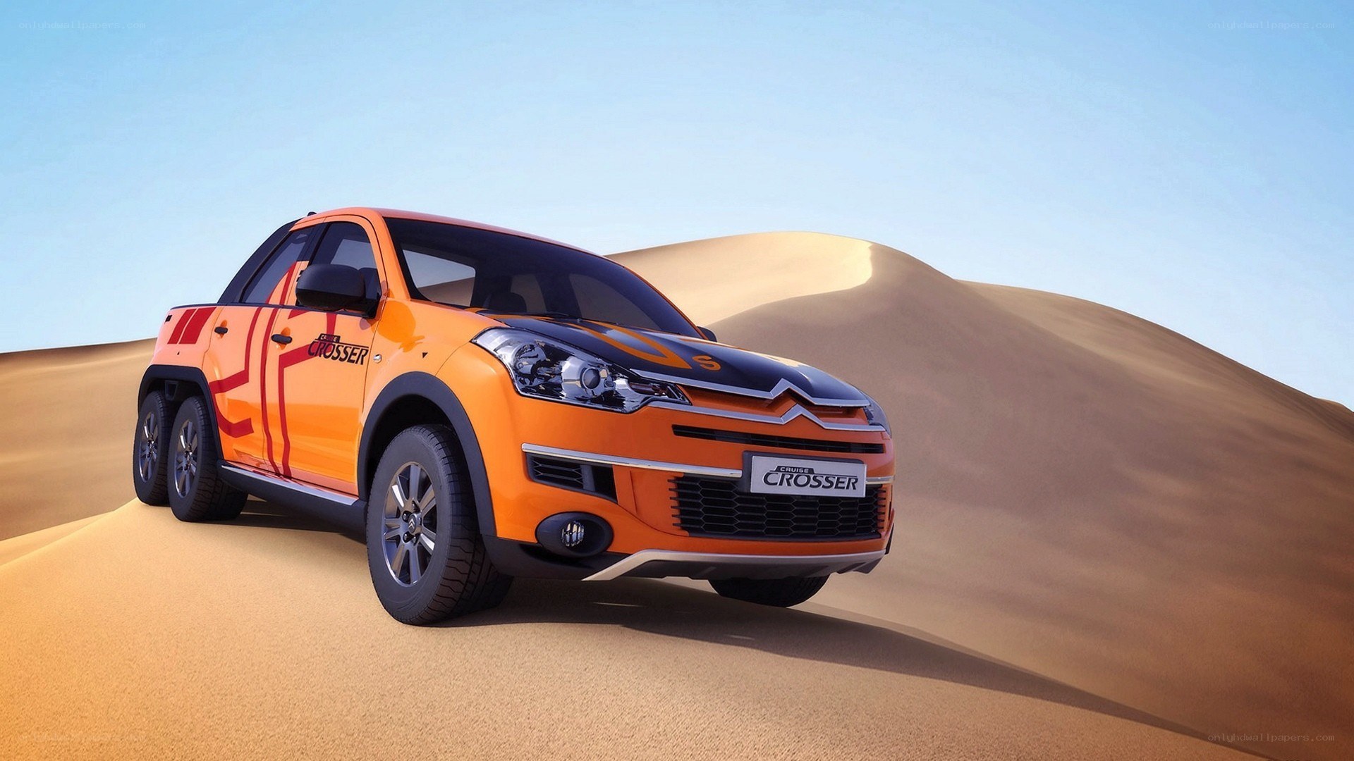 Orange Citroën C3 Picasso in desert