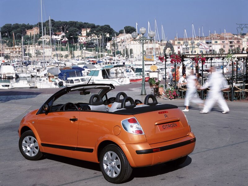 Orange Citroën convertible at marina