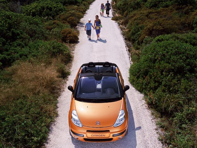 Orange Citroën on a country road