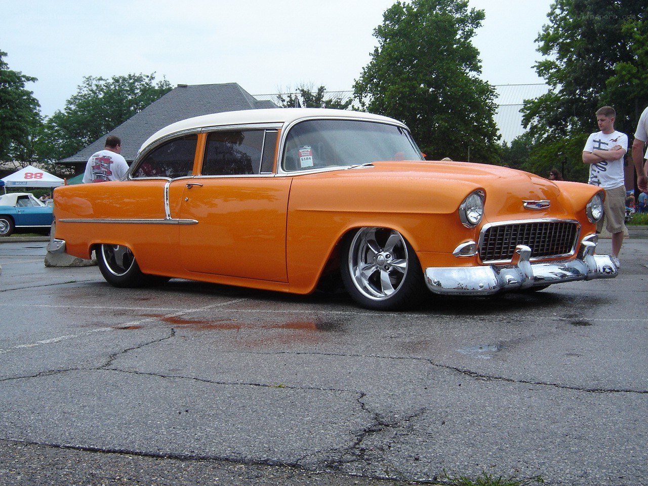 Orange classic car at a show