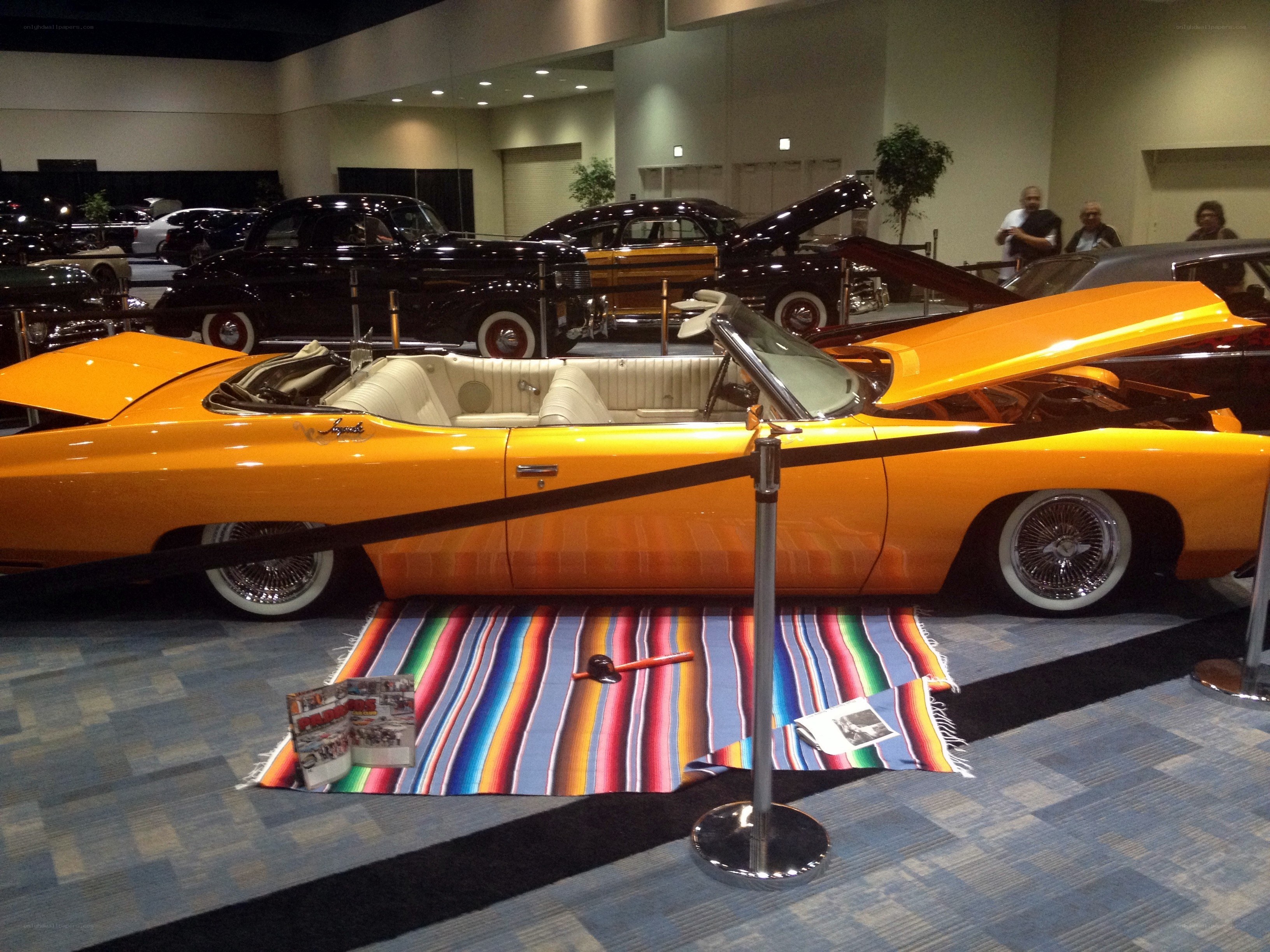 Orange classic car at show