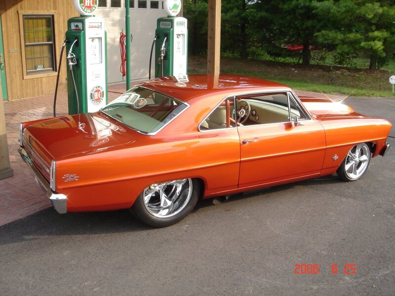 Orange Classic Car — Calm, Afternoon, Photograph, Gas Pumps