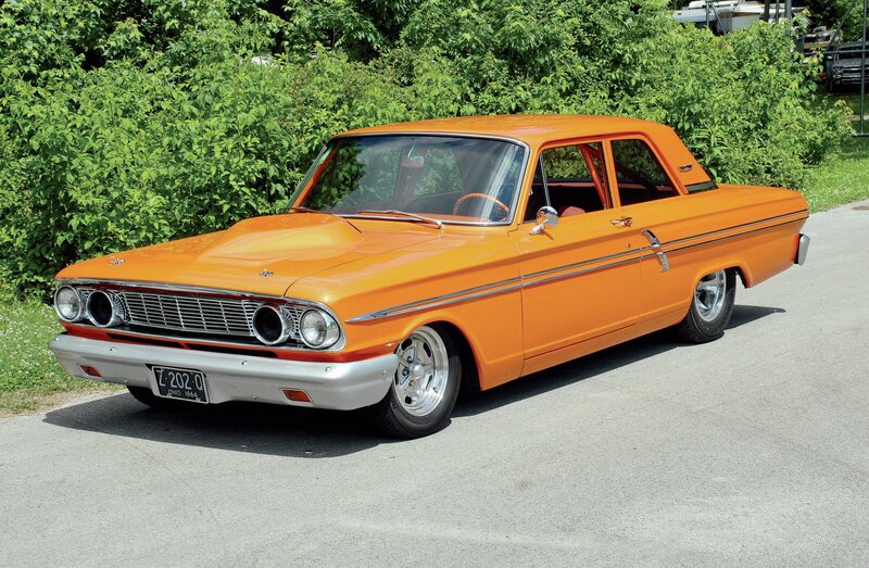 Orange Classic Car — Calm, Afternoon, Photograph, Green Bushes