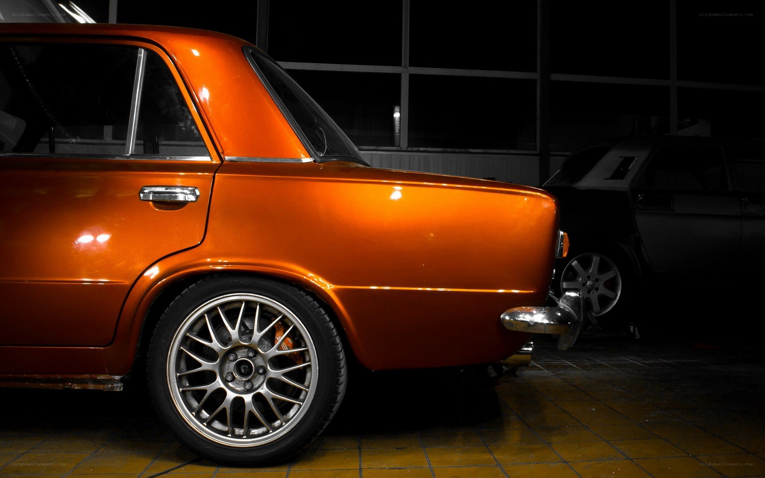 Orange classic car in garage