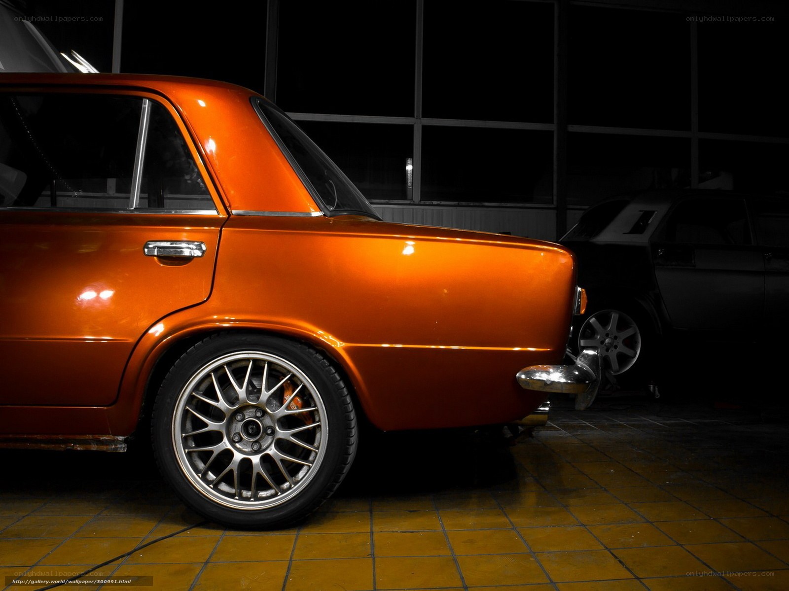 Orange classic car in garage