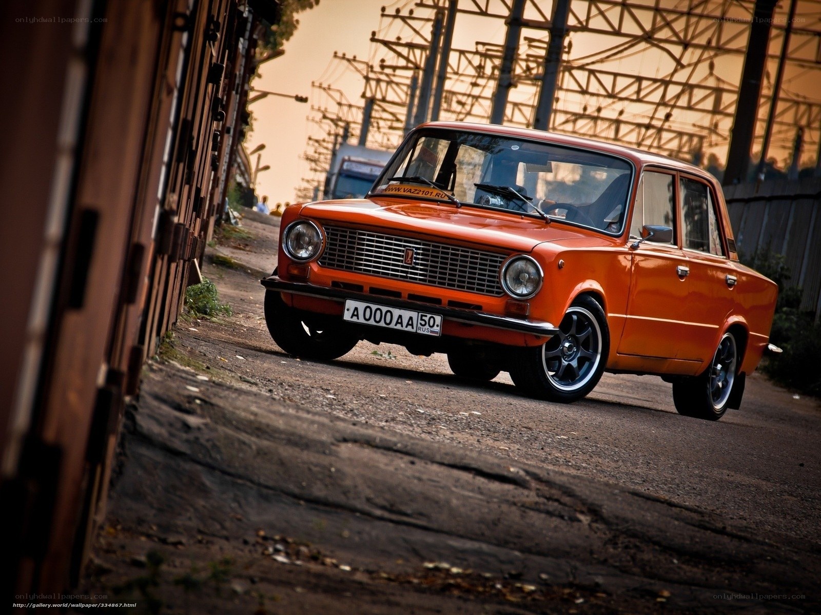 Orange classic car on a street