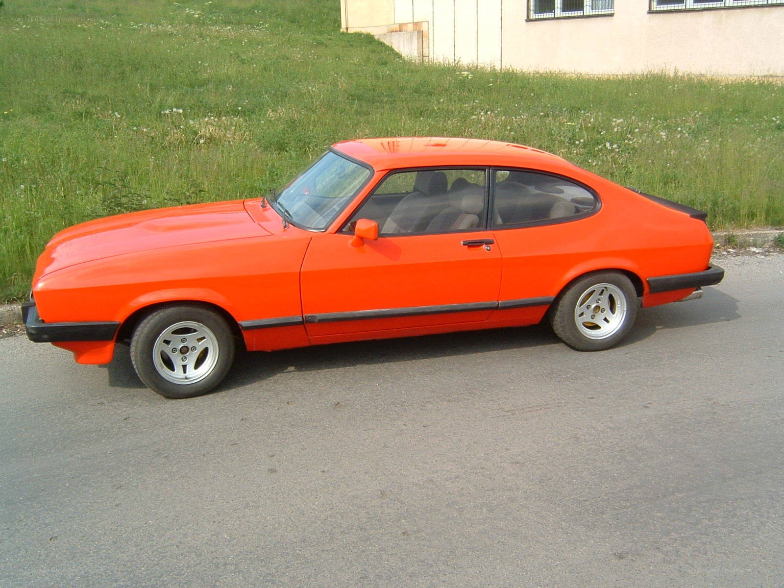 Orange classic coupe car