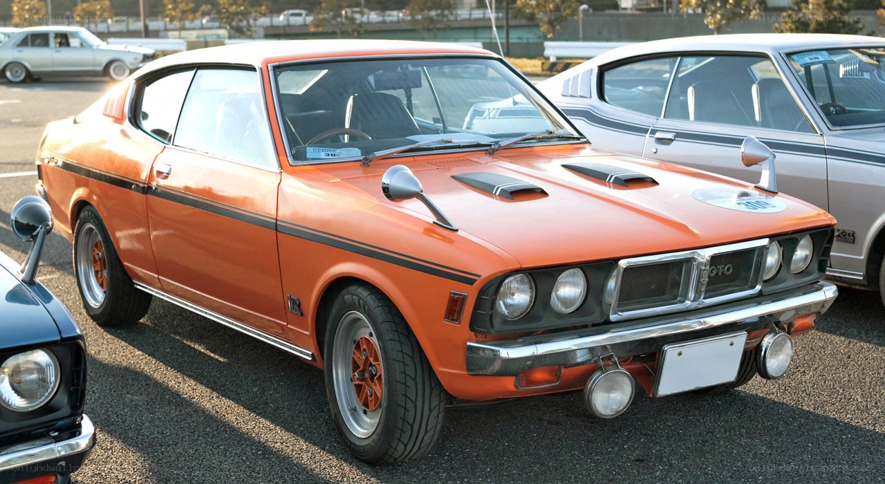 Orange classic coupe car