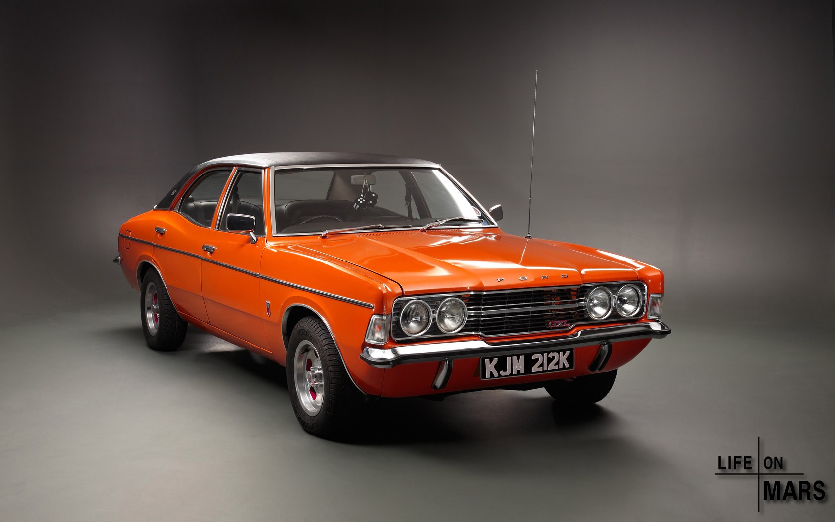 Orange classic Ford Cortina