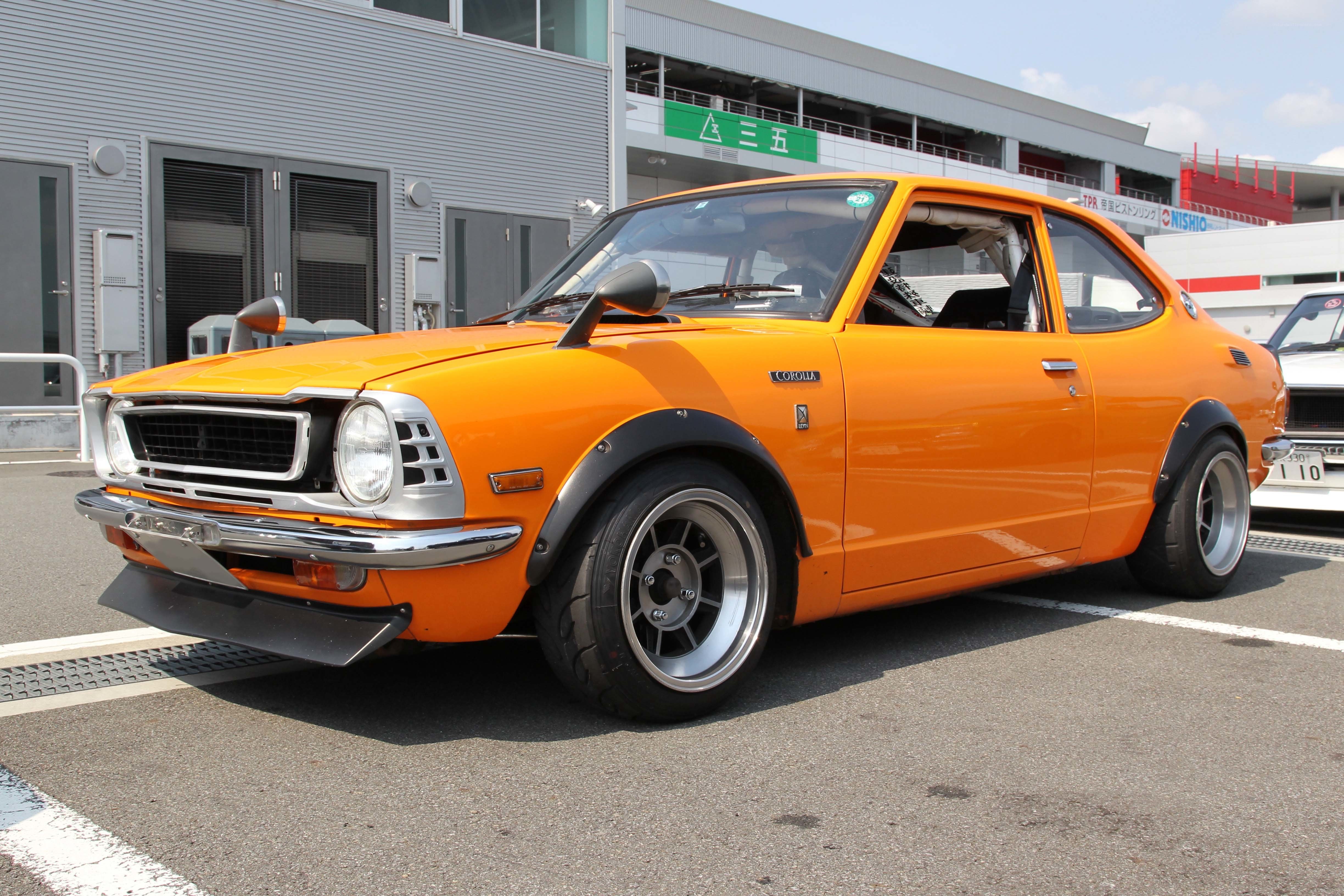 Orange classic Toyota Corolla