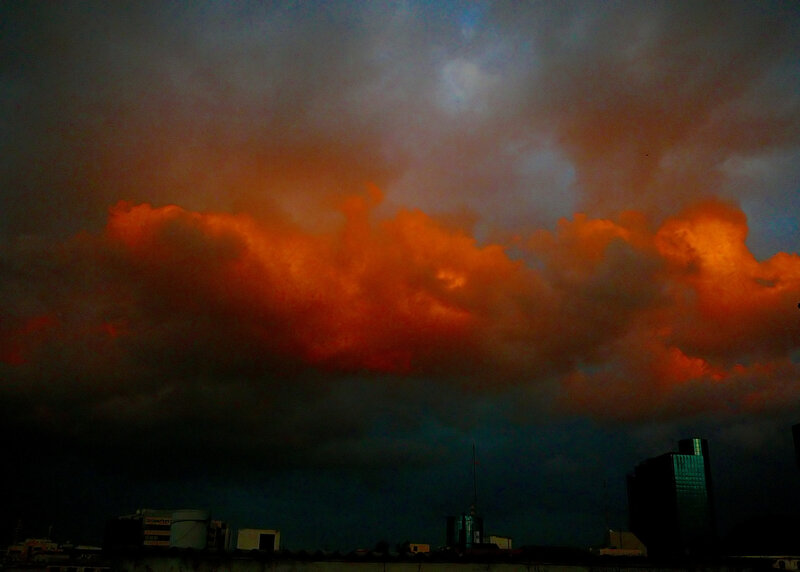 Orange Clouds over City