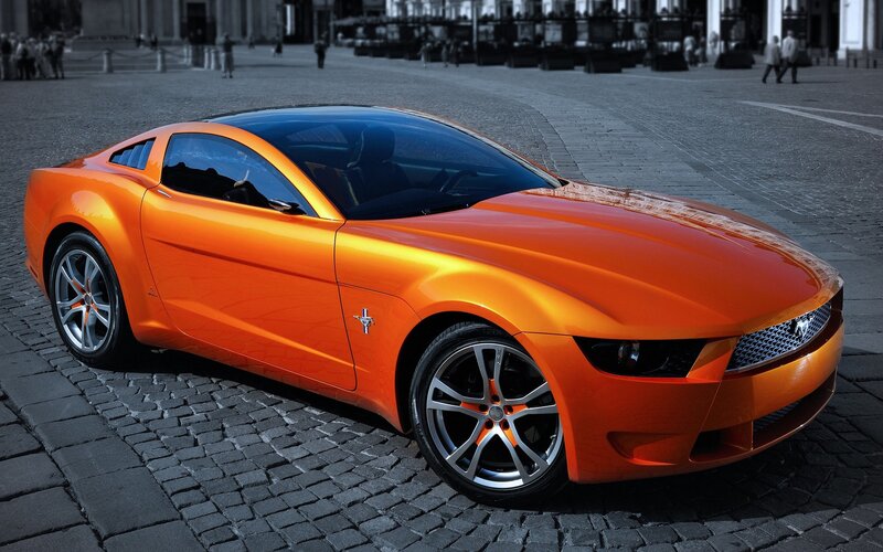 Orange Concept Car — Dramatic, Afternoon, Photograph, Cobblestone Street