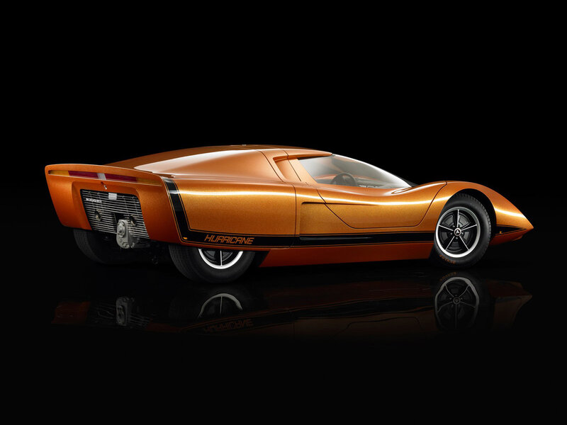 Orange Concept Car — Dramatic, Photograph, Black Background, Reflection