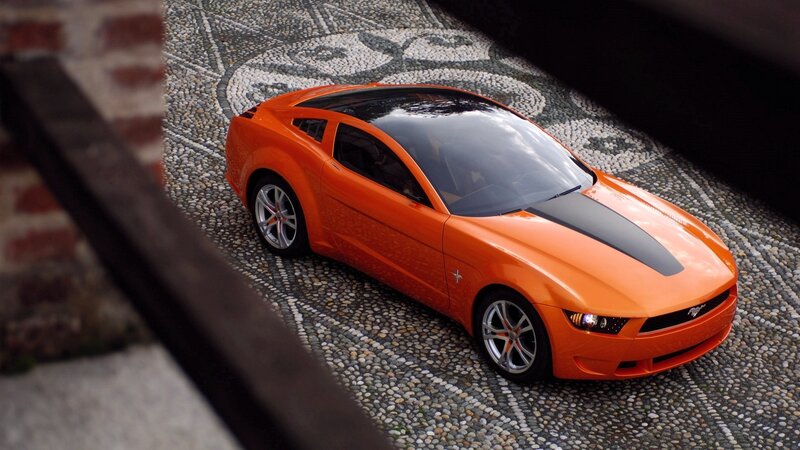 Orange Concept Car — Dramatic, Photograph, Cobblestone, Brick Wall