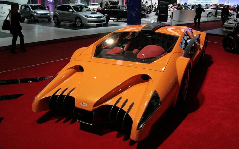 Orange Concept Car — Dramatic, Photograph, Red Carpet