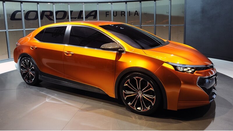 Orange Concept Car — Dramatic, Photograph, Showroom
