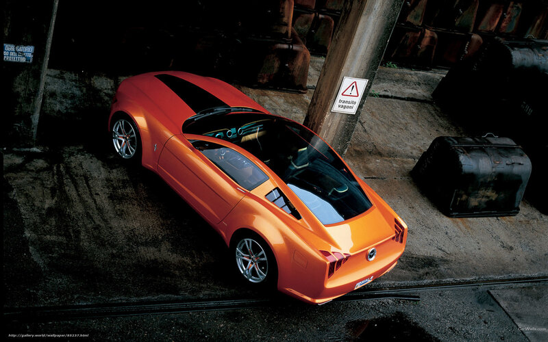 Orange concept car in alley