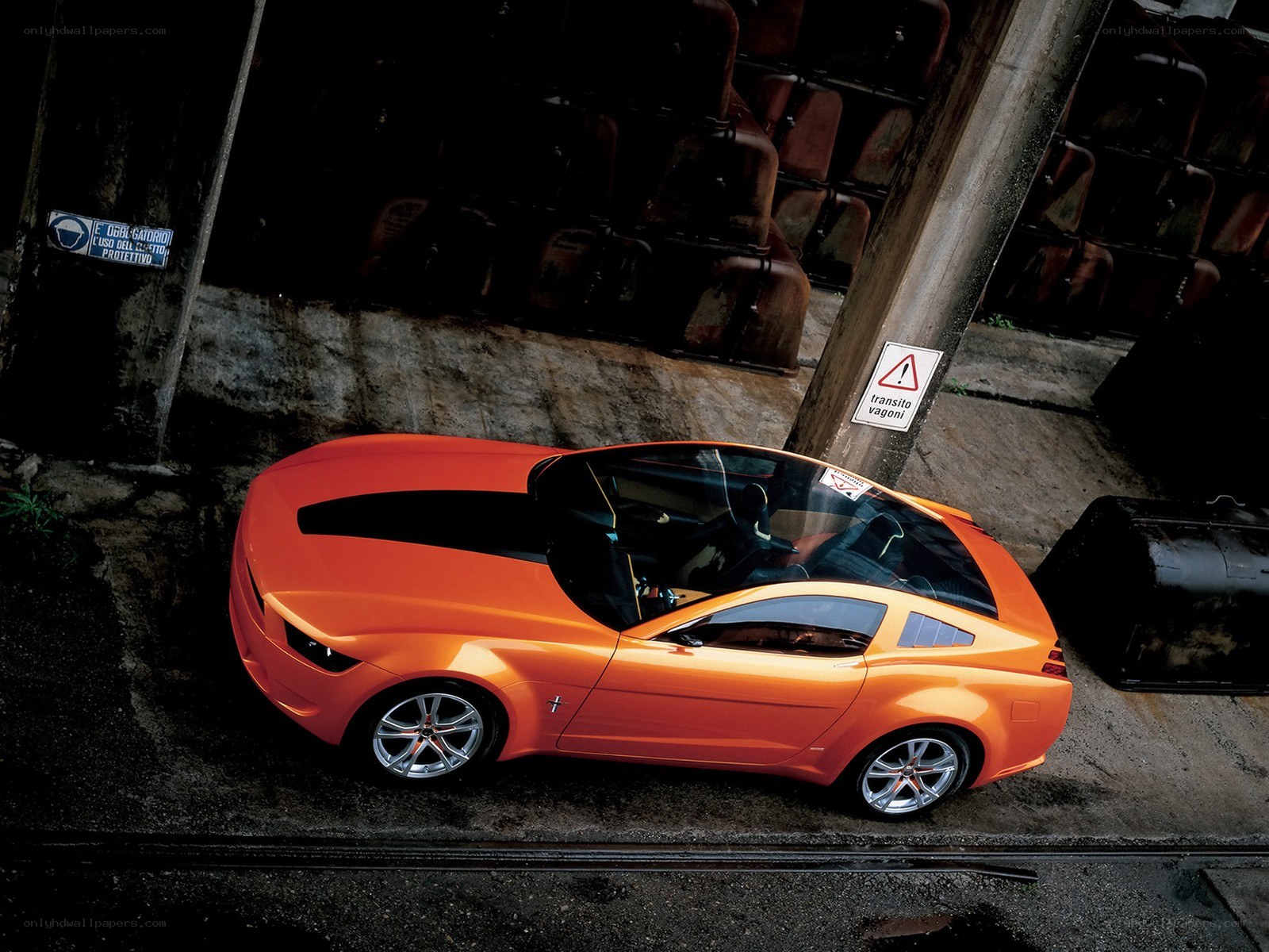 Orange concept car in industrial setting