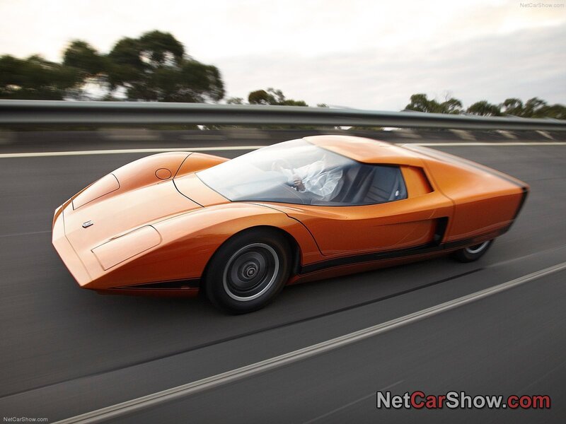 orange concept car in motion