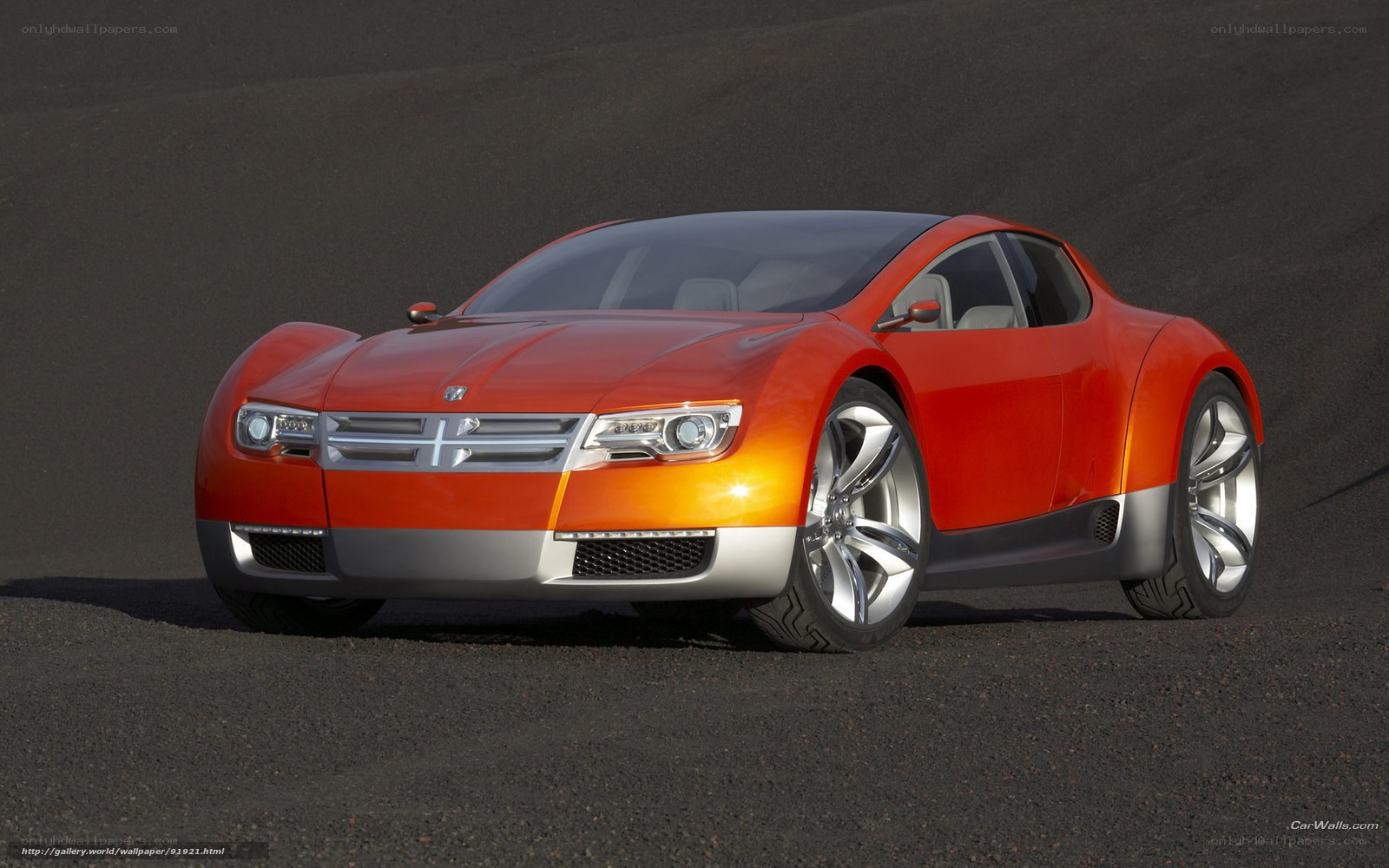 Orange concept car on dark ground