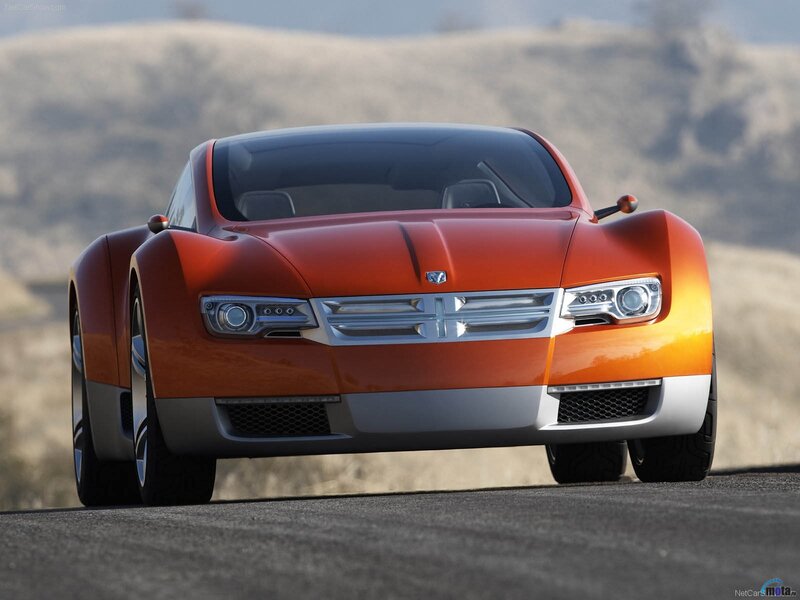 orange concept car on road