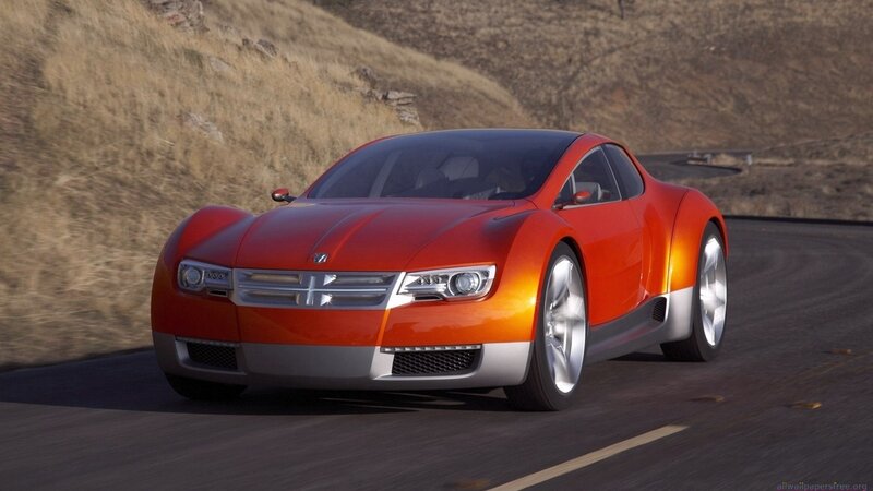 orange concept car on road