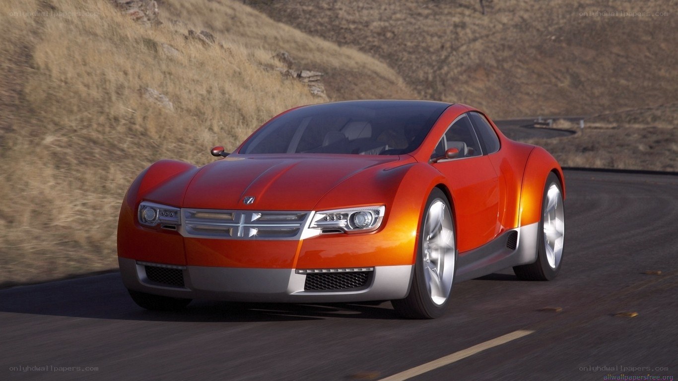 orange concept car on road