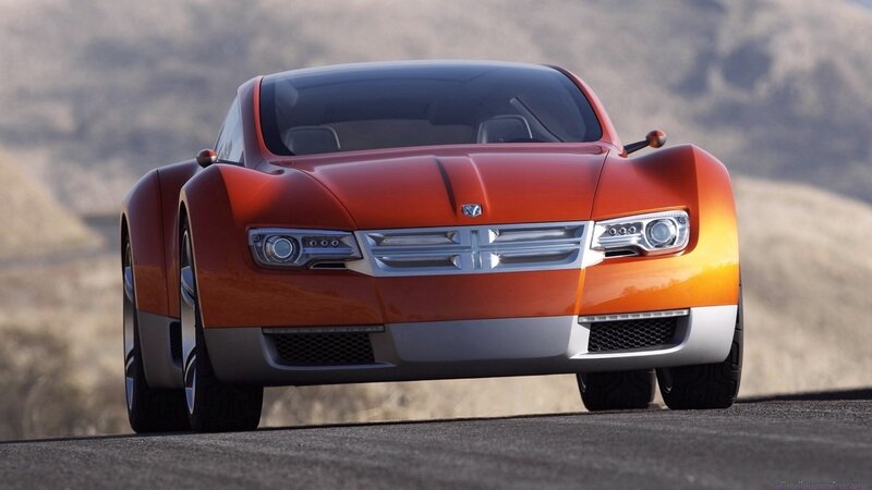 orange concept car on road