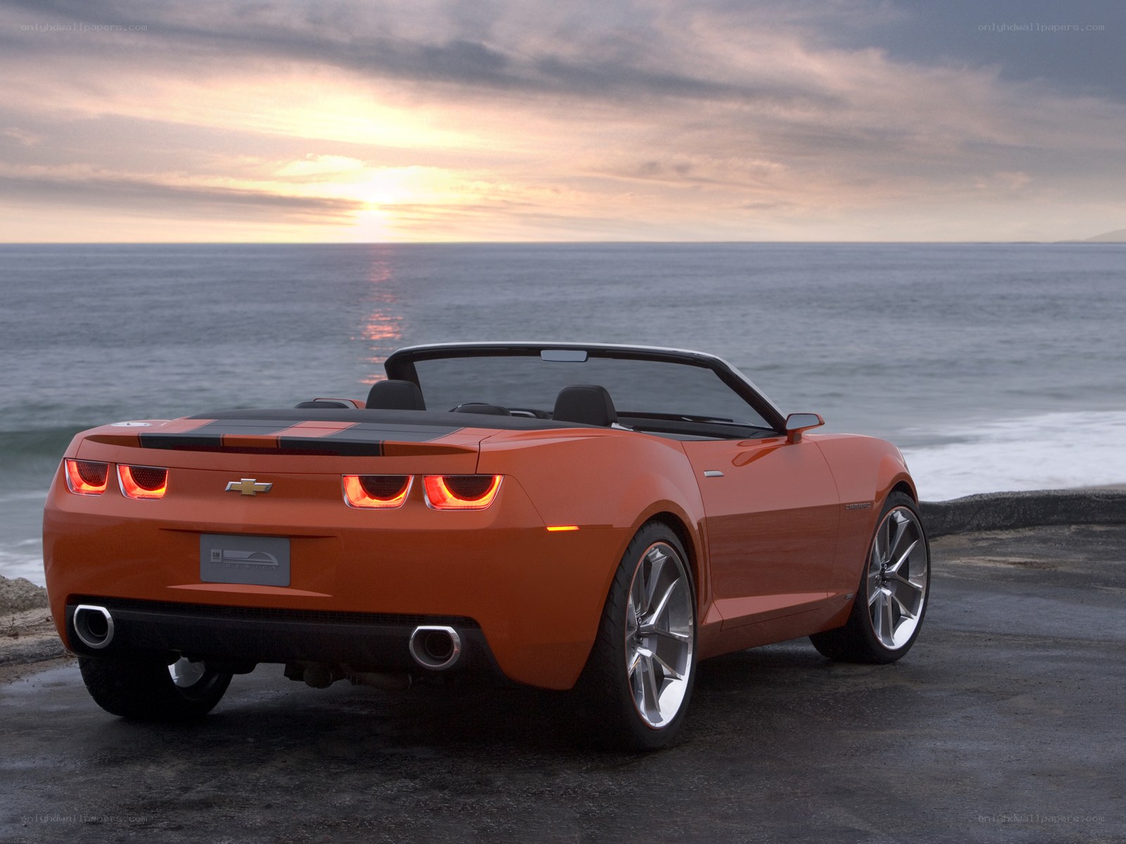 Orange convertible by the sea