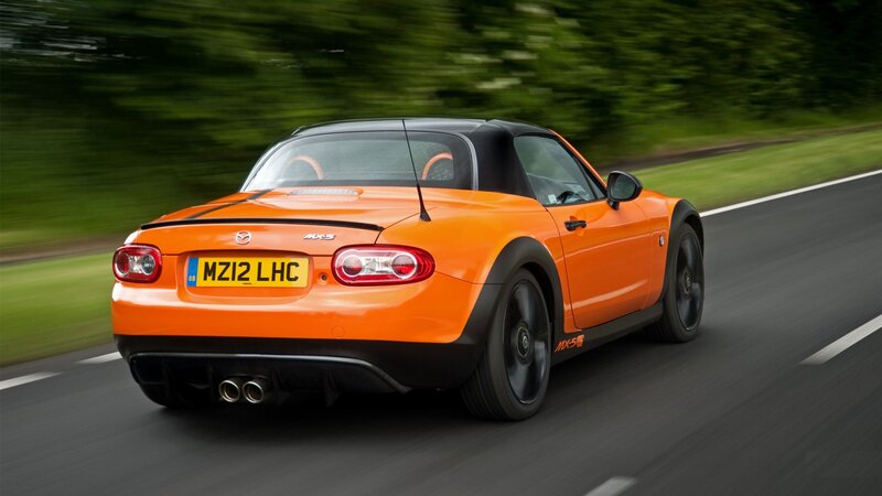 Orange Convertible Car — Dynamic, Afternoon, Photograph, Road, Trees, License Plate