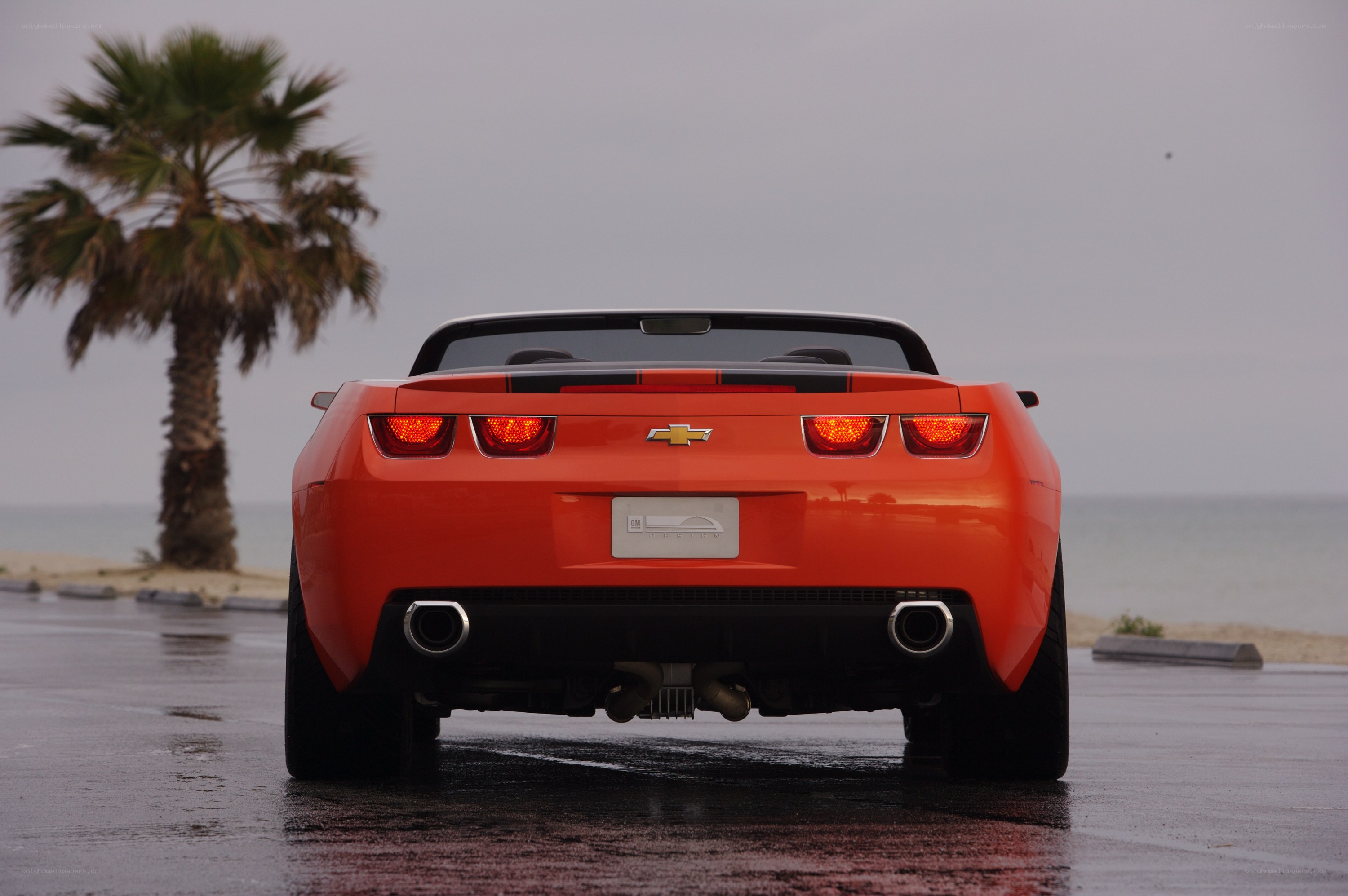 Orange convertible on beach