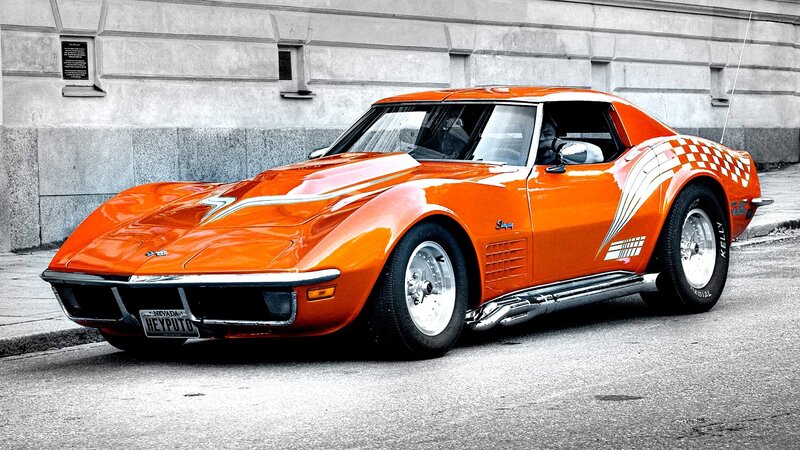 Orange Corvette Car — Dramatic, Photograph, Building