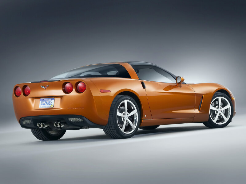 Orange Corvette Car — Dramatic, Photograph, License Plate, Wheels