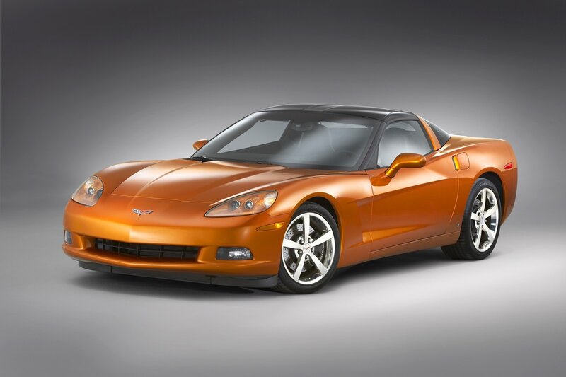 Orange Corvette Sports Car — Dramatic, Photograph, Wheels, Windows