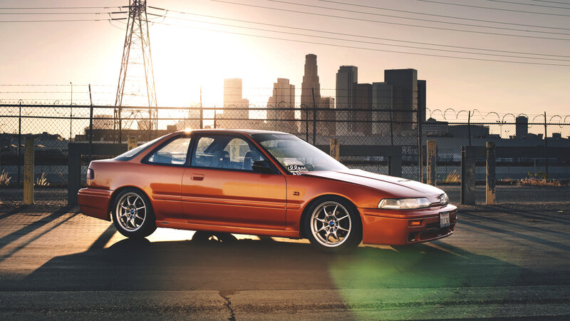 Orange Coupe Car — Dramatic, Sunset