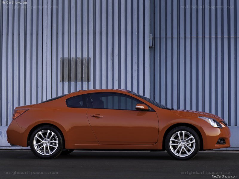 orange coupe car side view